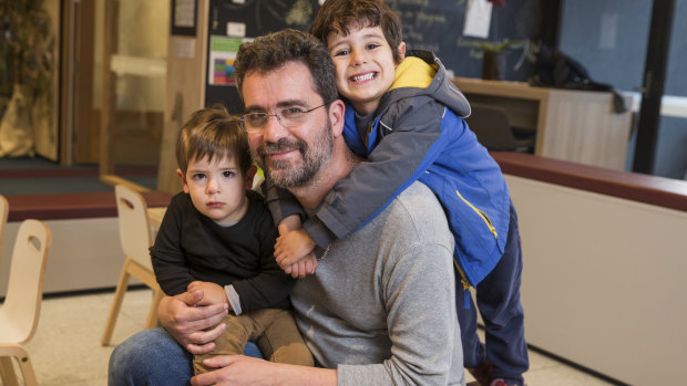 Giuseppe Infusini with his children Alessandro, 4, and Santiago 1.