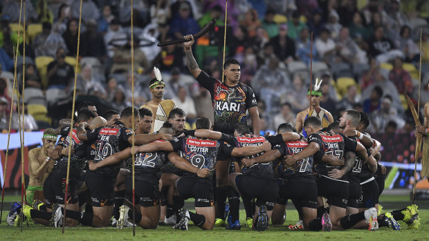 The Indigenous All Stars perform a ‘War Dance’ before the start of the NRL All Stars game.