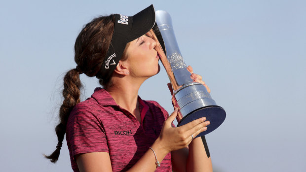 Breakthrough: England's Georgia Hall kisses the trophy after winning the Women's British Open at Royal Lytham