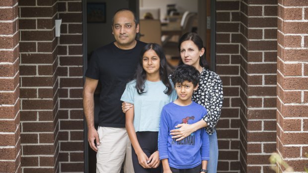 Ben and Amber Yamin, with their children Alina and Ayaan, are isolating at their home in Mount Waverley.
