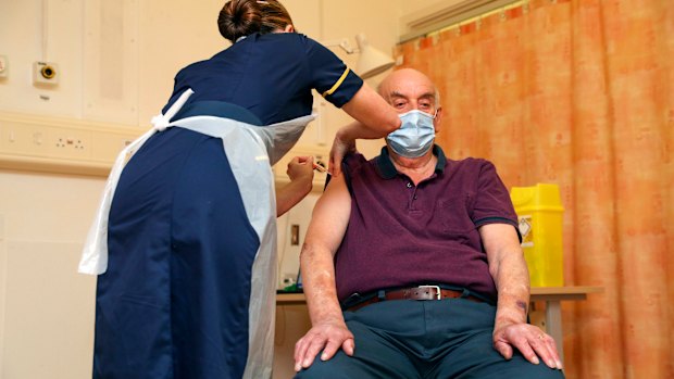 Brian Pinker receives the Oxford-AstraZeneca vaccine at Oxford University Hospital