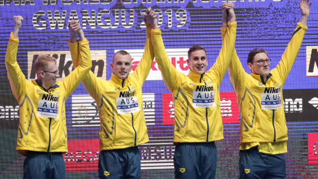 Clyde Lewis, Kyle Chalmer, Alex Graham and Mack Horton celebrate their win in the 4x200m freestyle relay at the World Swimming Championships.