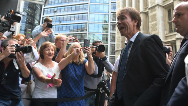 Singer Cliff Richard arrives at the Rolls Building to hear the ruling of his case against the BBC.