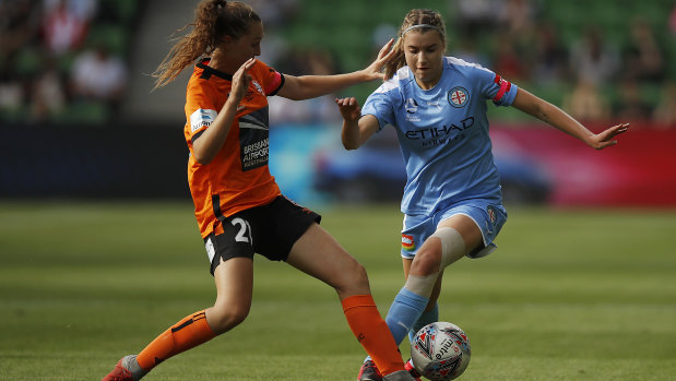 Block and tackle: City's Chelsea Blisset tried to find a way past Brisbane's Winonah Heatley.