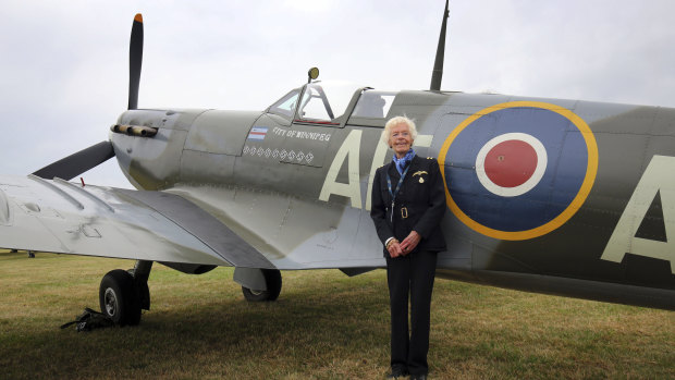 RAF Veteran World War II pilot Mary Ellis posing with a Spitfire at Biggin Hill Airfield, England. 
