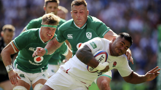 Running riot: Manu Tuilagi scores his side's third try in what quickly became a rout.