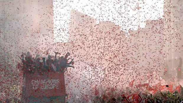 Painting the town red: Liverpool erupts to celebrate the Champions League victory.
