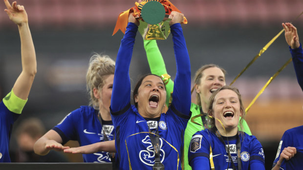 Chelsea’s Sam Kerr with the FA Women’s League Cup at Vicarage Road.