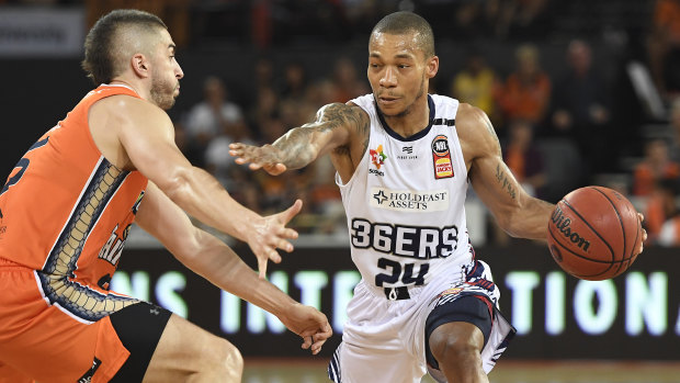 Jerome Randle (right), in action for the 36ers on Saturday, was among the players allegedly heckled by two Cairns men.
