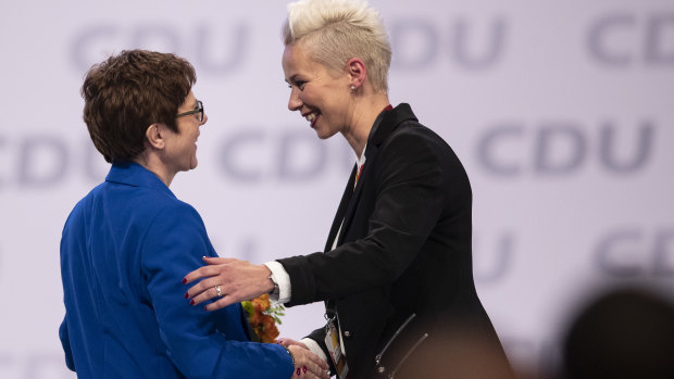 Silvia Breher chats with Annegret Kramp-Karrenbauer, leader of the German Christian Democrats (CDU) after she was voted new deputy leader of the German Christian Democrats (CDU) on Friday. 