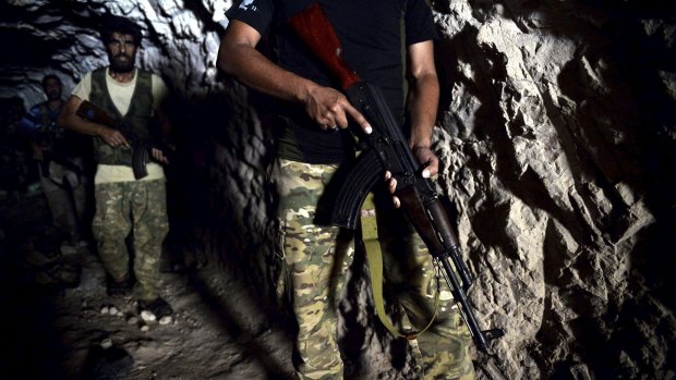 Fighters with the Free Syrian Army  hiding out in a cave on the outskirts of Idlib.