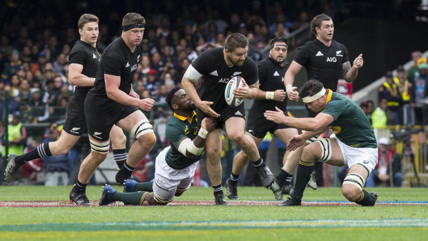 Back in the frame: Dane Coles runs with the ball.