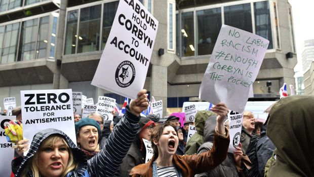 Protesters chant slogans during a demonstration organised by the Campaign Against Anti-Semitism against alleged prejudice in the Labour Party, amid a row over the party's handling of claims of anti-Semitism.