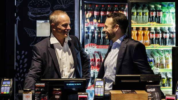 Craveable chairman Rob Coombe and chief executive Brett Houldin at Oporto in Sydney's Circular Quay. 