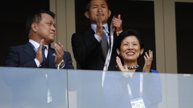 Princess Takamado, right, applauds prior to the group H match between Colombia and Japan in Russia.