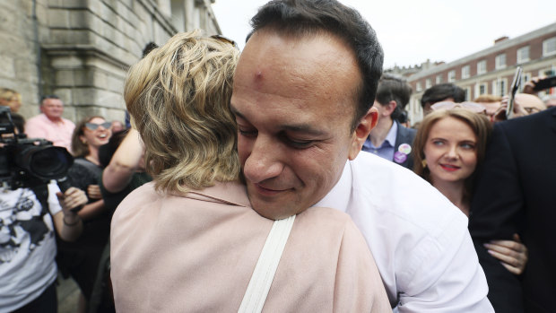 Ireland's Prime Minister Leo Varadkar, at Dublin Castle for the referendum results, embraces Senator Ivana Bacik. 