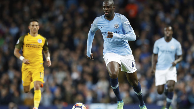 Fond farewell: Yaya Toure in his last home game for Manchester City.