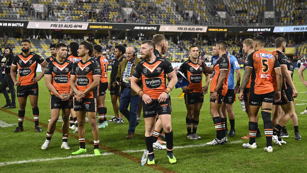 The Wests Tigers after their controversial last-second loss to the Cowboys.