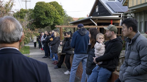 Prospective home buyers at an auction in Brunswick on Saturday.