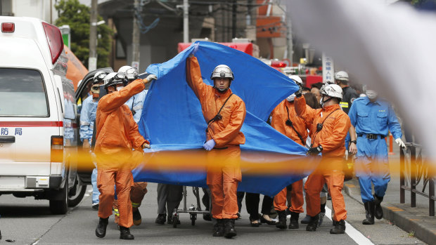 Emergency services at the scene of the attack in Kawasaki, near Tokyo.