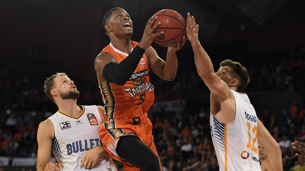 Scott Machado of the Taipans attempts a lay-up against Brisbane Bullets in Cairns on Saturday.