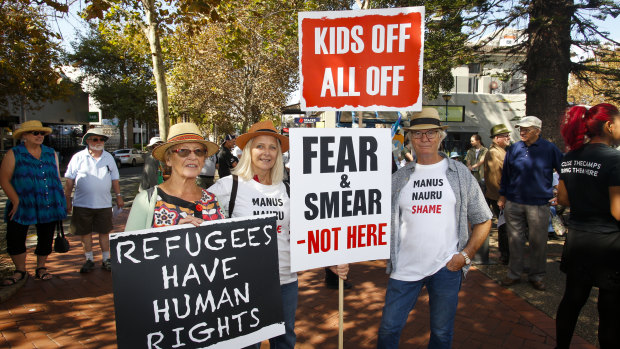Refugee advocates take to the streets in  Wollongong.