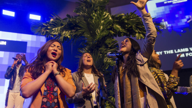 Christian Hillsong worshippers celebrated Easter mass their own way at the Grand Hyatt Hotel in Melbourne.
