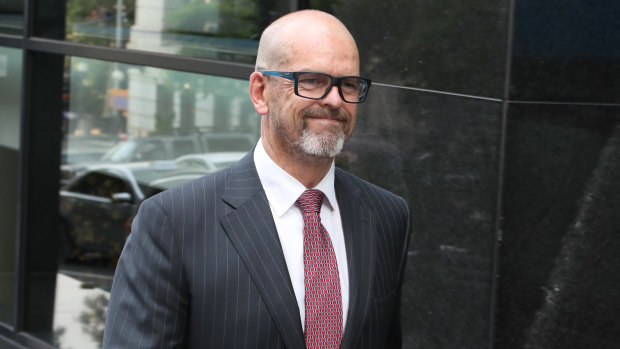 Simon Overland leaves the royal commission after it wrapped up for the year on Friday.