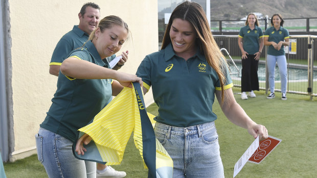 Rugby Sevens star Charlotte Caslick receives her Australian team uniform.