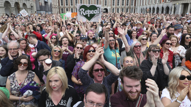 Members of the public celebrate at Dublin Castle, in May after the results of the referendum on the 8th Amendment of the Irish Constitution which prohibited abortion.