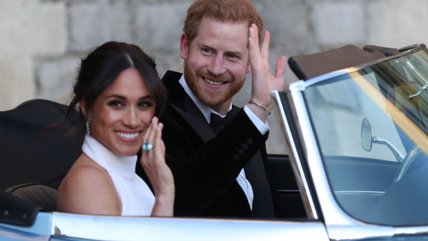 The newly married Duke and Duchess of Sussex in the E-Type Jag.