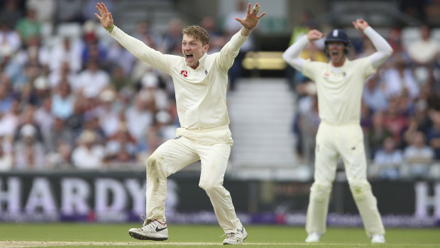 England's Dom Bess celebrates after taking the wicket of Pakistan's Imam ul-Haq.