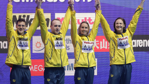 Australia's mixed 4x100m medley relay team, from left, Mitchell Larkin, Matthew Wilson, Emma Mckeon and Cate Campbell.