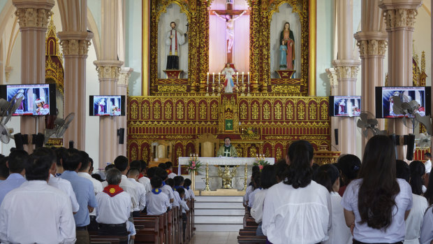 Priest Nguyen Duc Vinh leads a Sunday Mass at Phu Tang church in Yen Thanh district, Nghe An province, Vietnam.