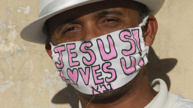 Churches to reopen: Evangelist Mikallo Britow wears an appropriate face mask in Sea Point, Cape Town.