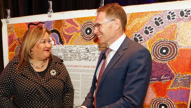 BHP CEO Andrew Mackenzie with  Professor Megan Davis, pro vice-chancellor Indigenous at UNSW, and the Uluru Statement from the Heart.  