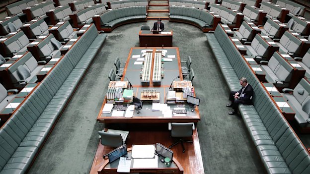 Christopher Pyne on his phone in the House of Representatives on August 23, 2018.