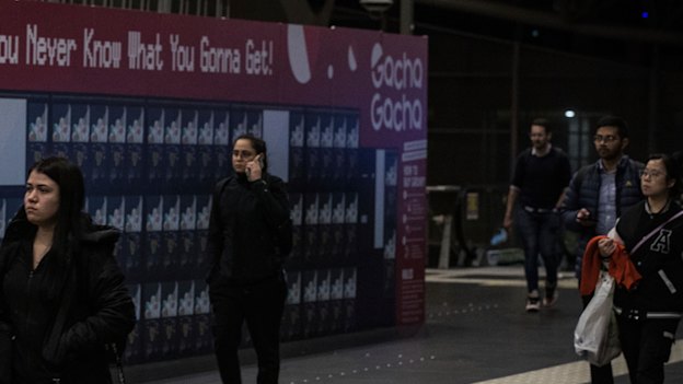 Hoarding wraps around unoccupied tenancies at Southern Cross Station.