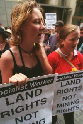 Demonstrators in Sydney march on John Howard's office in December 1997. 