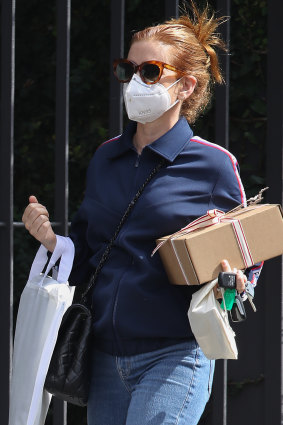 Isla Fisher shopping for a dress for her 45th birthday at The Intersection in Paddington.