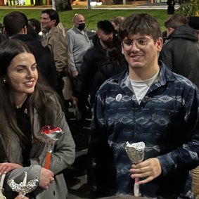 Fotis Kapetopoulos’ son Anastasios holds a candle at last year’s Easter service.