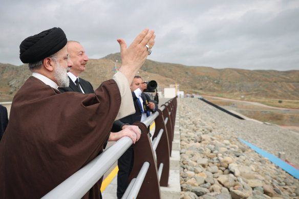 Iranian President Ebrahim Raisi (left) with Azerbaijani President Ilham Aliyev inaugurating the Qiz Qalasi Dam on their joint border just hours before Raisi’s helicopter crashed.