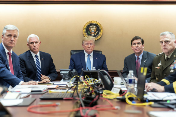 The Situation Room of the White House as US forces close in on Abu Bakr al-Baghdadi's compound. From left: national security adviser Robert O'Brien, Vice President Mike Pence, President Donald Trump,  Defence Secretary Mark Esper, Joint Chiefs Chairman Mark Milley and deputy director for Special Operations on the Joint Staff, Marcus Evans. 