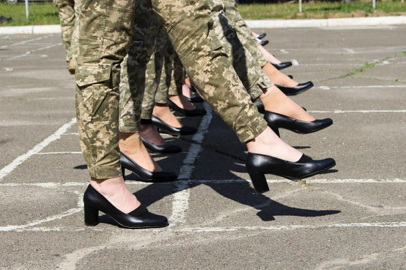 The soldiers wear heels while taking part in the the military parade rehearsal in Kyiv.