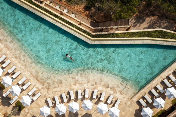 A guest luxuriates in one of two swimming pools at Six Senses Ibiza.