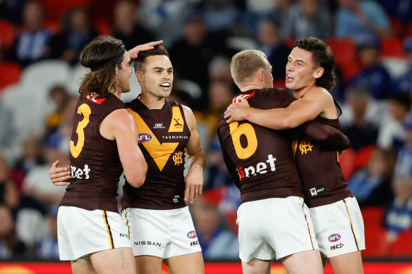 Hawks celebrate a goal.