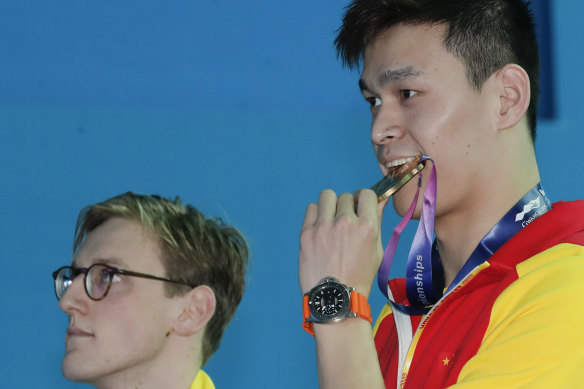  Horton, in silent protest,  refuses to take the podium beside China's Sun Yang.