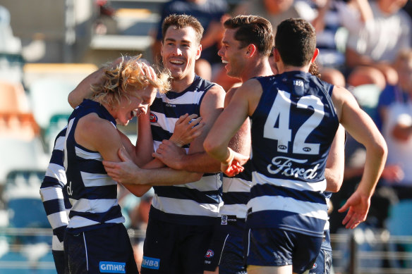 Ollie Dempsey celebrates a goal on debut.