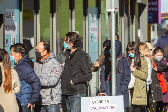 People queue for COVID-19 vaccines at Sunshine Hospital.