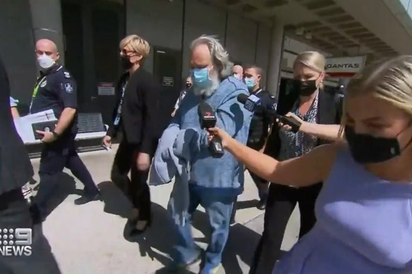 Peter Foster was extradited from Melbourne and arrived at Brisbane Airport in December.